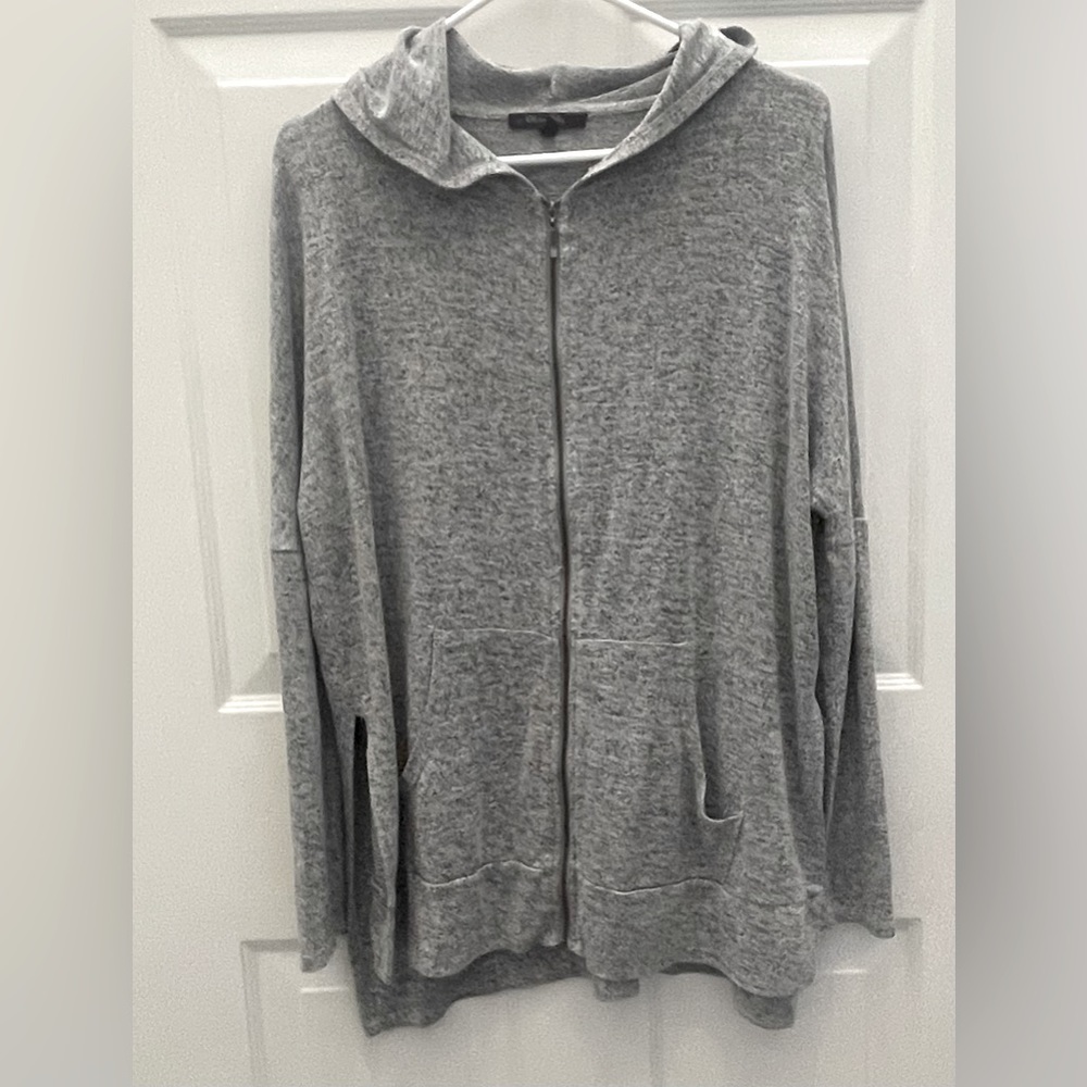 Olivia Sky, S zip jacket with hood. Long with slits on both sides. Gray